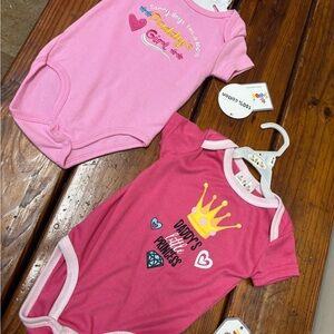 Pink Baby Onesies with Cute Graphics